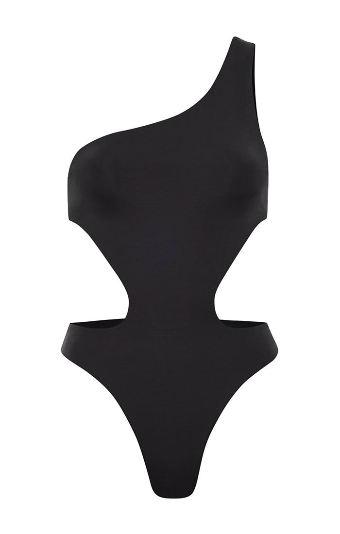 Sophisticated chic swimwear? Absolutely! Slip into our Nora black Cutout One-Shoulder One Piece and you will feel like you have entered a new dimension. Time will stand still and all eyes will be on you. The sweeping curve across the bodice up to your shoulder, combined with artfully sculpted and placed cutouts, makes this more than swimwear. This is a piece of wearable art. The way it elongates your body, and the way you feel when you wear it are indescribable. Not content to wear this solely b Luxury Swimwear With Asymmetrical Neckline For Swimming, Luxury One-piece Swimwear Bodysuit, Luxury Sleeveless Polyamide Swimwear, Luxury Asymmetrical Neckline Swimwear For Beach, Luxury Sleeveless Bodysuit For Swimming, Luxury Asymmetrical Neckline Swimwear For Parties, Luxury Sleeveless Cutout Swimwear, Luxury One-piece Swimming Bodysuit, Cheap Fitted Leotard For Swimming