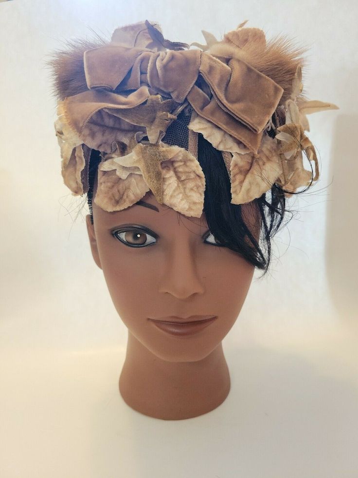 Rare Vintage Mink Lined Hat w/ Leaves by Helen Hat Shop Ventura Helen M. Austin. This hat is so unique and beautiful ! Shades of brown, cream, and taupe leaves on mesh, with a velvet bow. Lined around the top with what I am pretty certain is mink by the look and feel of it. Hat is about 4 inches high, and 7 inches across. This is a hard to find brand, and this piece is in very good shape. Vintage Short Brim Top Hat For Costume, Vintage Beige Mini Hat For Party, Beige Vintage Mini Hat For Party, Vintage Beige Cloche Hat With Curved Brim, Vintage Brimmed Top Hat For Costume, Vintage Beige Top Hat With Curved Brim, Vintage Beige Top Hat With Short Brim, Adjustable Vintage Mini Hats For Winter, Adjustable Vintage Winter Mini Hats