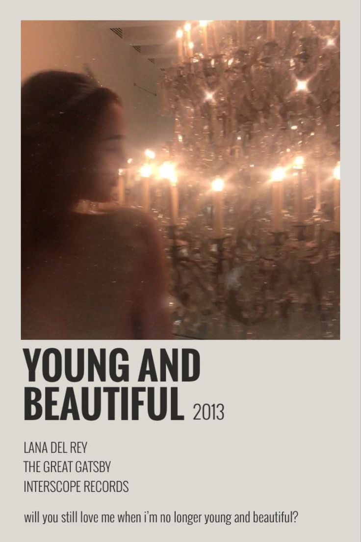 a woman standing in front of a chandelier with candles behind her and the words young and beautiful 2013 written below it