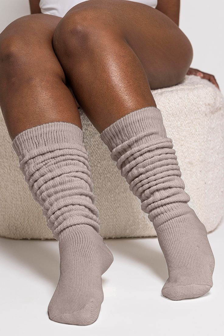 Revel in the nostalgia of the 80's with our Thunda Slouch socks - redesigned to offer unmatched softness and stretch to fit ALL foot sizes, easily! Designed to slouch, these lightweight socks offer a laid-back vibe perfect for lounging, dancing, or simply embracing your inner retro fashionista. With 13 vibrant colors to choose from, the Thunda Slouch collection brings a touch of nostalgia to the spring-summer season. Simply pull up the extra long length and slouch them down for the perfect relax Casual Comfortable Thigh High Socks, Casual Elastic Footless Socks, Casual Soft Socks For Loungewear, Casual Socks, One Size, Casual Solid Color Socks One Size, Casual One-size Socks, Cozy Stretch Beige Socks, Comfortable Knee-high Socks One Size, Comfortable One Size Knee-high Socks