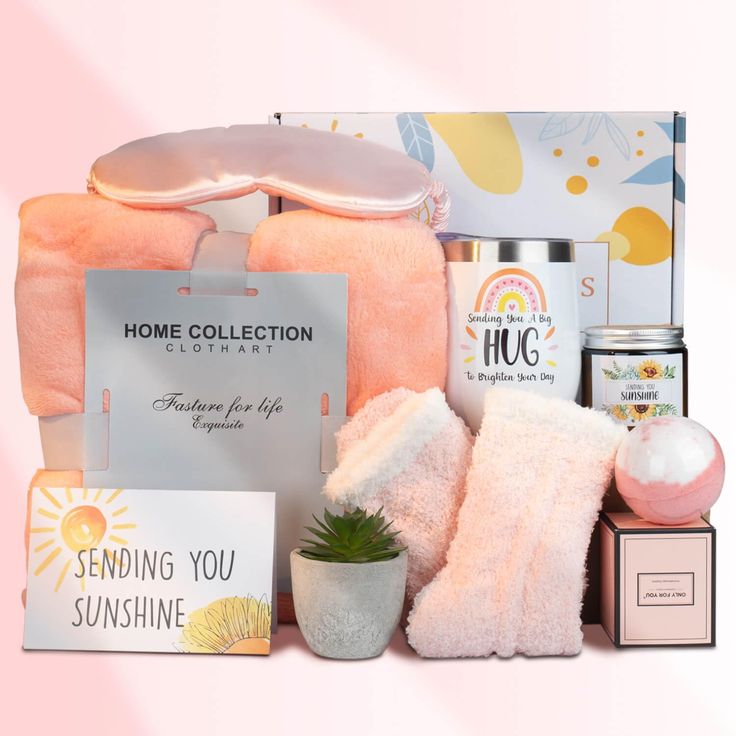 a pink gift box filled with personal care items