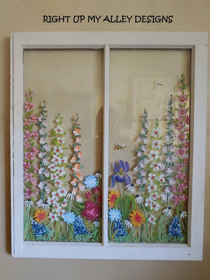 the window is decorated with flowers and butterflies