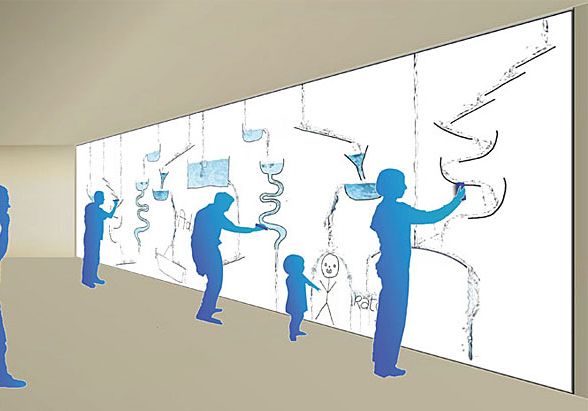 several people standing in front of a wall with drawings on it