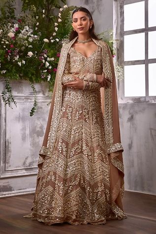 Beige Anarkali featuring full sleeves, deep V neck, and all-over florence embroidery with gota and pearls. Paired with a dupatta adorned with gota plume embellished border., Fit: Relaxed Designer Long Sleeve Lehenga With Sheer Dupatta, Festive Long Sleeve Churidar With Mirror Work, Fitted Long Sleeve Anarkali Set With Mirror Work, Wedding Kurta With Mirror Work And Long Sleeves, Reception Long Sleeve Kurta With Dupatta, Long Sleeve Wedding Kurta With Mirror Work, Traditional Long Sleeve Reception Wear With Mirror Work, Long Sleeve Lehenga With Dabka Work For Eid, Long Sleeve Lehenga With Intricate Embroidery For Eid