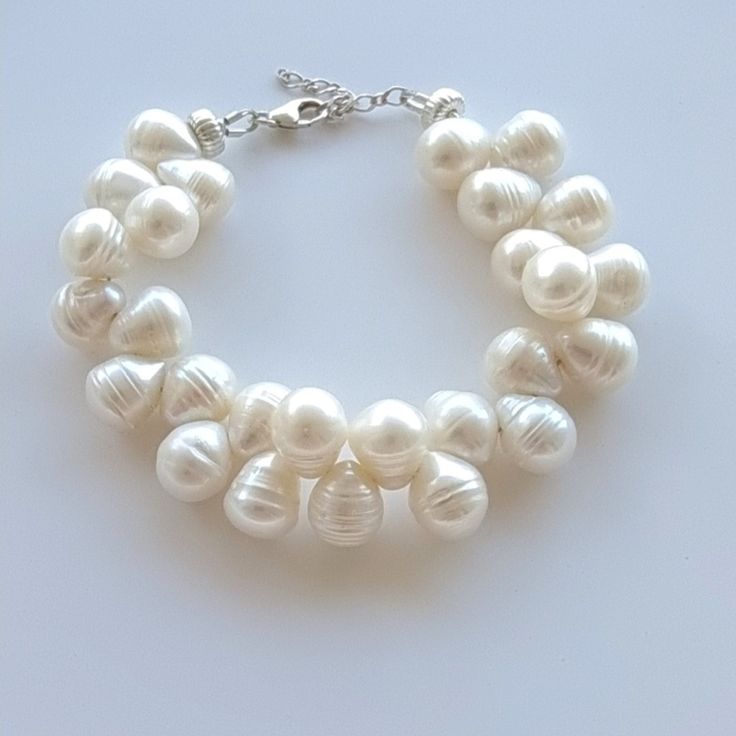 A large and special pearl bracelet for a woman. These pearls are drilled and strung in a special way to have a delicate vining pattern. (Pearls will have to be flipped over once the bracelet is put on so that every other one goes one way and every other goes the other. Some of them will lay down correctly, naturally. Size: 16.5 cm +3.5 Extra/ 6.49 Inches Features: ❤ Freshwater Pearl, and Silver 925 ❤ Handmade item ❤ All my jewelry is sent in a beautifully decorated box (perfect for a gift)We als Pearl Bead Bracelet, Bracelet Pearl, Big Pearl, Freshwater Pearl Bracelet, Bead Bracelet, Pearl Bracelet, Pearl Beads, Favorite Jewelry, Freshwater Pearls