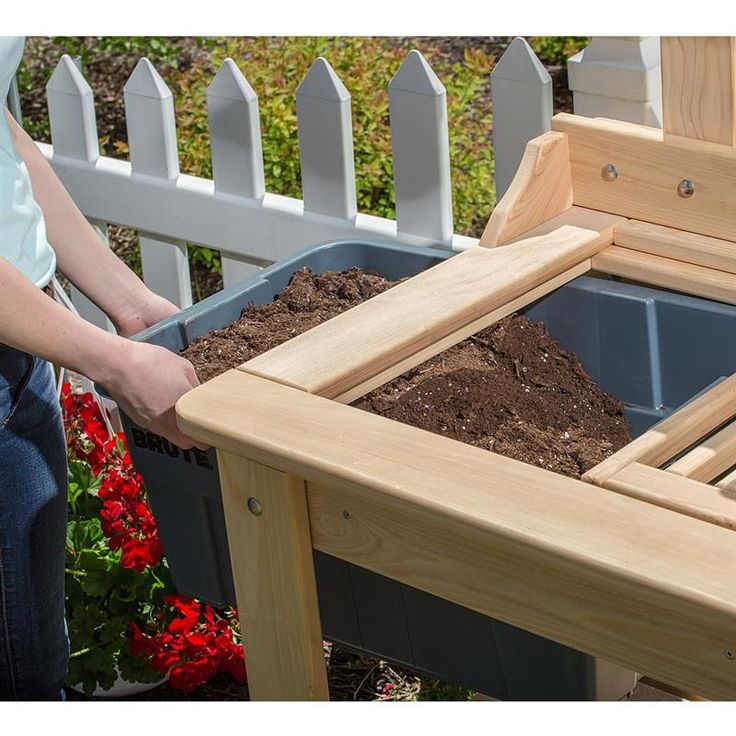 https://www.lehmans.com/p-2090-cypress-potting-table.aspx Planting Station Potting Tables, Outdoor Potting Table, Planting Bench, Potting Area, Garden Work Bench, Potting Bench Ideas, Potting Plants, Potting Bench Plans, Outdoor Potting Bench