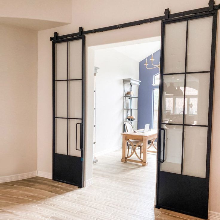 french sliding barn double door with 6-lite-glass-pane and kickplate French Barn Doors, Casa Garage, Modern Sliding Barn Door, Metal Doors, Pantry Doors, Glass Barn Doors, Metal Barn, Double Barn Doors, Kick Plate