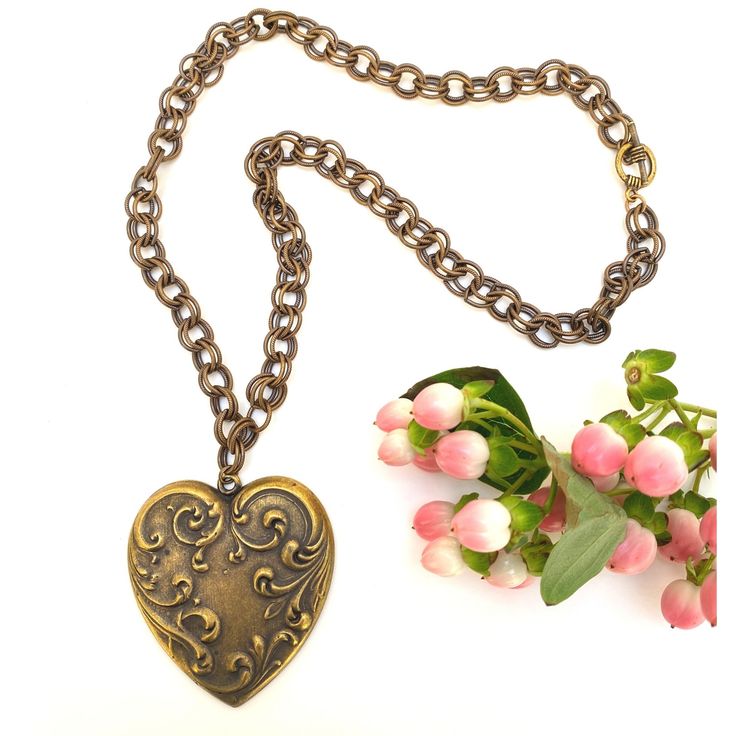 This heart necklace features a large vintage inspired heart medallion. the necklace is 22" in length and closes with a toggle clasp. The heart is 2.25" wide and 2.5" in length. It is perfect for anyone who loves vintage and also the cottagecore look. Heart Necklace Vintage, Necklace Vintage, Toggle Clasp, Vintage Necklace, Heart Necklace, Antique Gold, Antique Brass, Vintage Antiques, Vintage Inspired