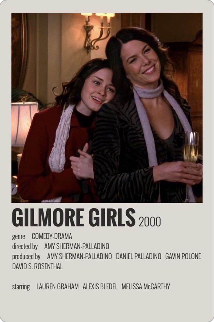 two women standing next to each other in front of a poster that says gilmore girls 2000