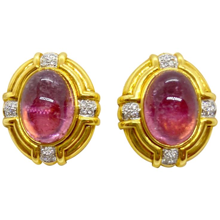 Classic 18 karat yellow gold clip on earrings, centering cabochon oval Pink Tourmalines and round brilliant Diamond accents. The earrings measure 1" x 1" approximately. Posts can be added. Stamped with the jewelers hallmark Pink Tourmalines weight apprx. 22.00 Diamond weight 0.55 carats Luxury Cabochon Clip-on Earrings For Formal Occasions, Classic Cabochon Clip-on Earrings For Formal Occasions, Fine Jewelry Yellow Gold Cabochons For Formal Occasions, Luxury Round Cabochon Clip-on Earrings, Oval Yellow Gold Cabochons For Formal Events, Oval Cabochons For Formal Wear Fine Jewelry, Yellow Gold Oval Clip-on Earrings With Polished Finish, Formal Clip-on Earrings With Oval Cabochon, Luxury Formal Clip-on Earrings With Cabochon