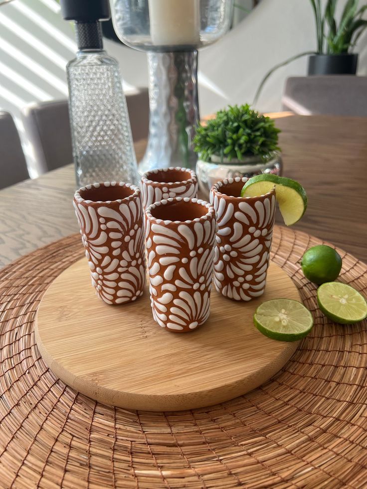 Each piece is individually priced. Tequila glasses have a height of 7 cm. Shot glass and Mint Tequila Talavera bar utensil, all available for individual purchase. These Talavera ceramic pieces are a perfect choice for those who enjoy mezcal or tequila. This delightful tasting set elevates the experience of sipping tequila or mezcal to a higher level; the handmade ceramics complement any decor style. Add authenticity to your tequila nights while supporting talented local Mexican artists and artisans with this set of Talavera ceramic shot glasses. Handmade in Mexico with love! MACARENA COLLECTION Talavera Party Favors, Tequila Bar Design, Ceramic Shot Glasses Handmade, Mexican Shot Glasses, Pink Talavera, Tequila Glasses, Talavera Decor, Ceramic Shot Glasses, Hacienda Decor