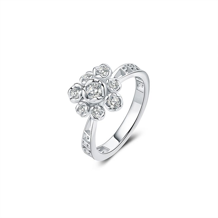 There's nothing as eye-catching as the sparkle of a glistening ring gracefully resting on a woman's hand.Now,you can wear a ring with a beautiful flower design. This simple and engraved ring is sure to be one of your favorites!Weight: 2.97 gHeight: 11 mmMaterial: Plating Color: Silver Elegant Silver Flower Diamond Ring, Elegant Silver Flower-shaped Diamond Ring, Elegant Flower Shaped Rings With Diamond Accents, Elegant Rings With Diamond Accents And Flower Shape, Elegant Flower-shaped Rings With Diamond Accents, Elegant Flower Shaped Promise Ring, Sparkling Flower Jewelry For Anniversary, Sparkling Flower-shaped Jewelry For Anniversary, Sparkling Flower-shaped Anniversary Jewelry