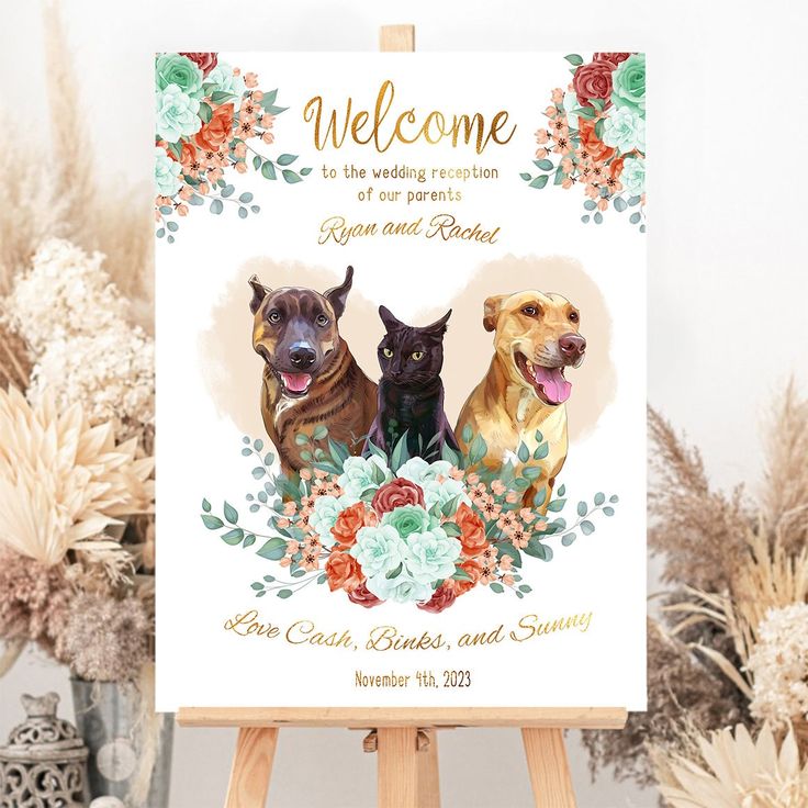 a welcome sign with two dogs and flowers