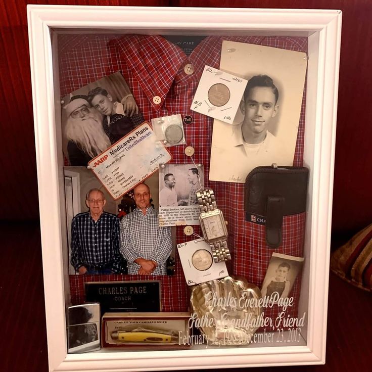 a display case with photos and memorabilia in it