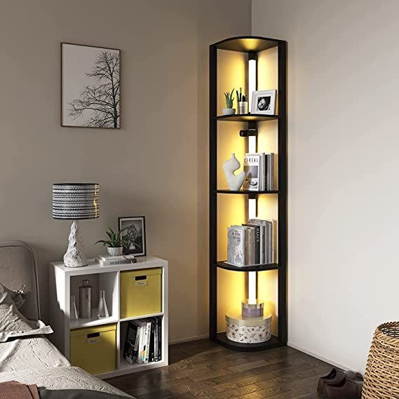 a bed room with a neatly made bed and a book shelf