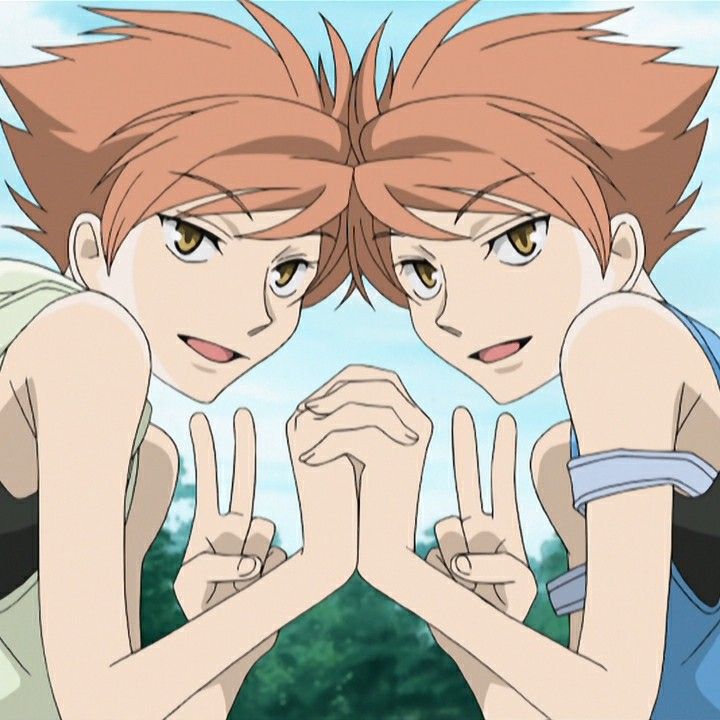 two anime characters are making the peace sign with their hands in front of each other