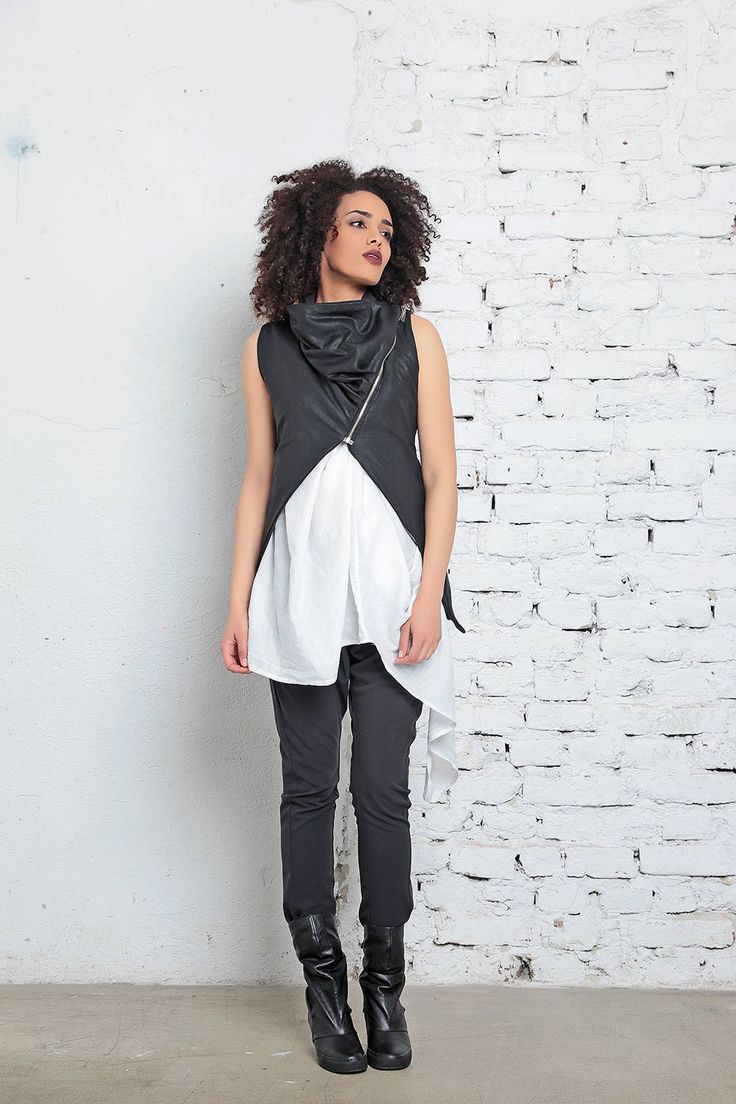 Women Vest, Black Vest, Futuristic Clothing Sleeveless asymmetrical vest in sating gloss cotton: |KIKO| Asymmetrical black vest with lustrous and smooth feel. A stylish finish to your casual or formal outfit with its oversized draped neckline and a front diagonal zipper. GARMENT FEATURES: *Slim fit, asymmetrical silhouette *Exaggerated shawl collar *Asymmetrical large front metal zipper *Elongated back *Fully lined, in matching poplin cotton SIZE & FIT: Model is 175cm and wears size S. COMPO Asymmetrical Vest, Sleeveless Sweaters, Futuristic Clothing, Gothic Tops, Women Vest, Summer Vest, Clothing Summer, Sweater Vest Women, Black Vest