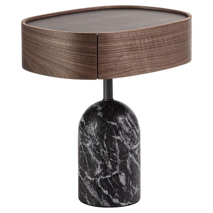 a table with a wooden base and black marble on the top, in front of a white background