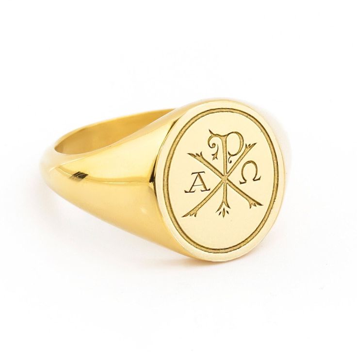 A beautiful Chi Ro Cross design engraved in our best-seller signet rings! *real images of the ring, taken by us* Face Size: 13x11mm Material: - Sterling Silver (925) - 9K Gold (375) - 14K Gold (585) - 18K Gold (750) *All signet rings are hallmarked on the back for certification* - We offer FREE Worldwide DHL & FedEx Shipping! - Branded DanelianJewelry Gift Box with each order! Our customer service is available 7 days a week. Leave us your message, and we will get back to you within a little time Classic Engraved Signet Ring For Commemoration, Engraved Oval Signet Ring For Commemoration, Symbolic Oval Etched Signet Ring, Symbolic Etched Oval Signet Ring, Engraved Oval Symbolic Signet Ring, Heirloom Signet Ring For Commemoration, Heirloom Round Signet Ring For Commemoration, Classic Signet Ring With Engraving For Commemoration, Classic Jewelry Ring With Engraved Logo