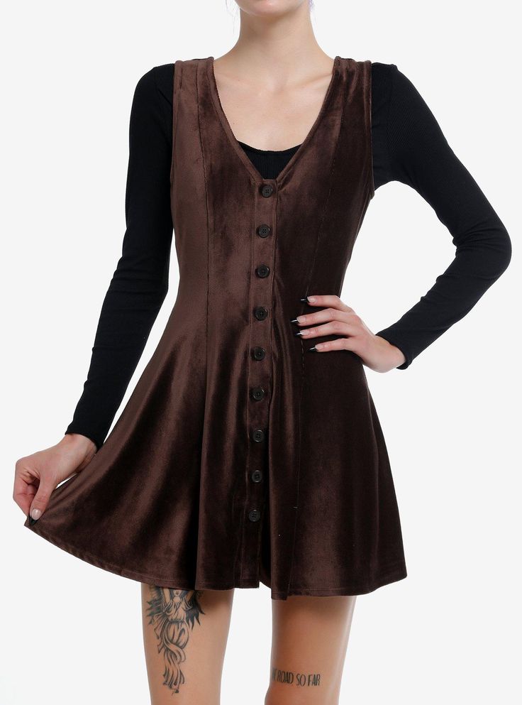 Make room for the cozy cottage dress of your dreams! This brown corduroy dress has a V-neckline and features buttons down the front. Perfect for layering over a cozy long-sleeve! Shirt not included.95% polyester; 5% spandexWash cold; dry lowStretchy materialLength: 33''ImportedListed in junior sizesModel is 5'10''Model wears size Small Dress And Shirt Layer Outfit, Brown Corduroy Dress, Cottage Dress, Underbust Corset, Brown Corduroy, Corduroy Dress, Layering Outfits, Cozy Cottage, Corset Dress