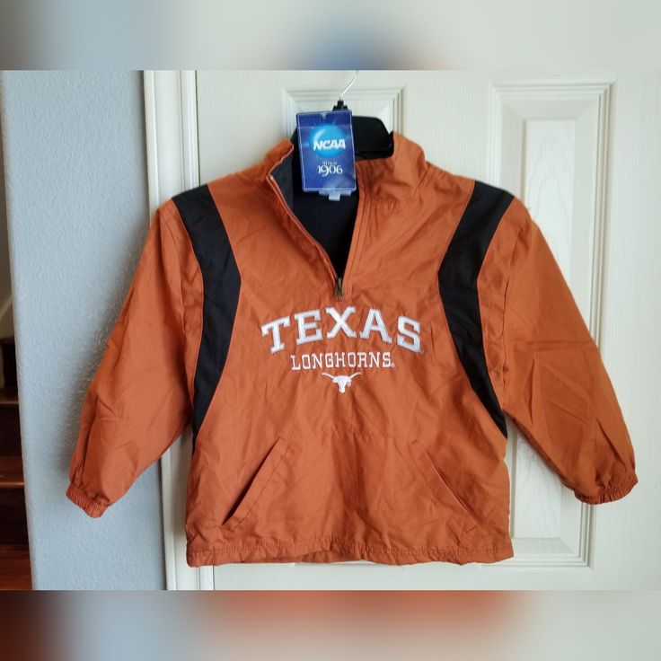 Brand New With Tags. Unisex. Texas Longhorns Pull Over Jacket. Kids Size Large 10-12. Used And In Excellent Condition! Orange Sporty Windbreaker For Fall, Sporty Orange Windbreaker For Fall, Orange Outerwear For Sports In Fall, Casual Fall Windbreaker For School, Winter Brown Outerwear For School, Pull Over Jacket, Over Jacket, Toddler Jacket, Zip Coat