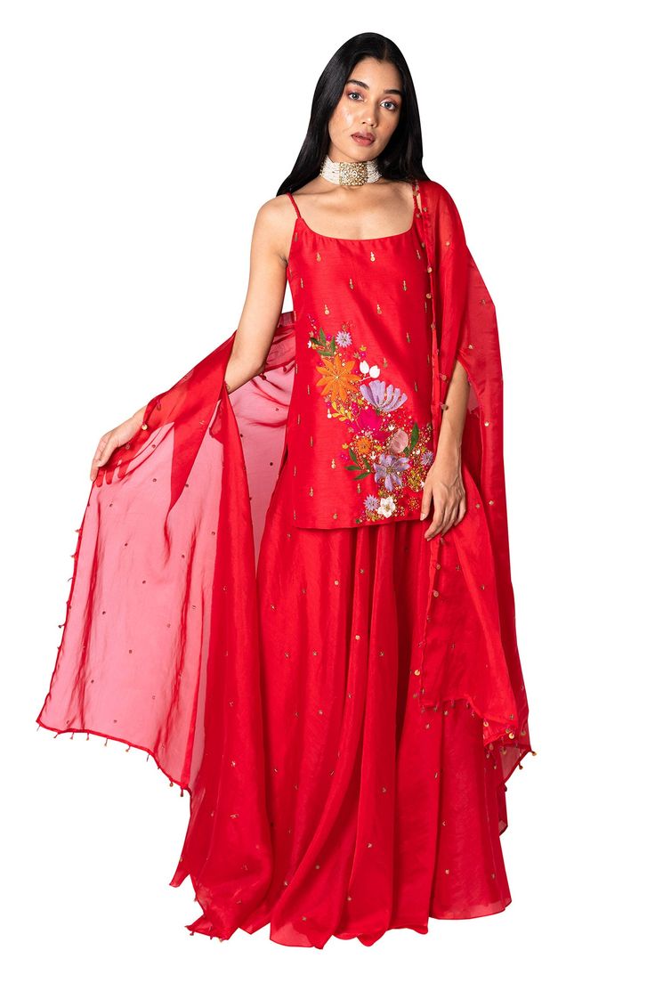 Red short kurta with floral embroidered motifs and sequin work. Paired with embroidered sharara and embroidered organza dupatta.
Component: 3
Embroidered
Neckline: Scoop Neck
Sleeve Length: Sleeveless
Fabric: Raw Silk, Organza
Color: Red
Embroidered dupatta - Aza Fashions Abhinav Mishra, Embroidery Abstract, Beige Kurta, Embroidered Sharara, Red Kurta, Short Kurta, Embroidered Motifs, Embroidered Organza, Embroidered Dupatta