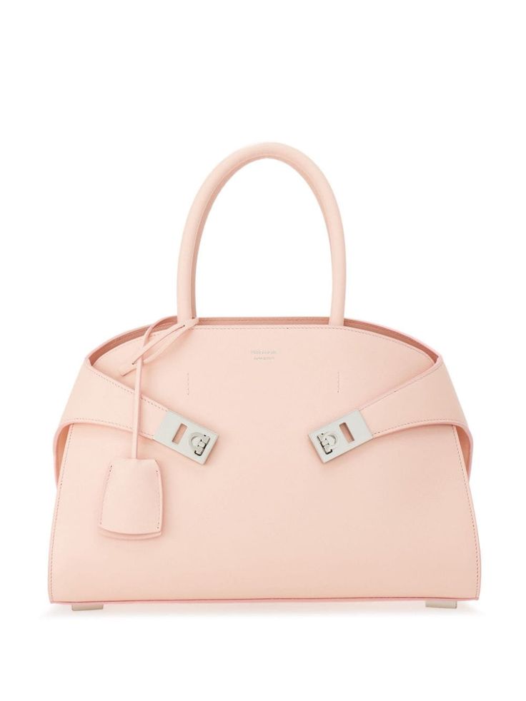 blush pink leather tonal stitching silver-tone hardware debossed logo to the front Gancini flip-lock fastening two top handles adjustable detachable shoulder strap main compartment internal zip-fastening pocket Ferragamo Bag, Debossed Logo, Pink Leather, Pink Bag, Pink Tops, Womens Tote Bags, Salvatore Ferragamo, Leather Crossbody Bag, Leather Crossbody