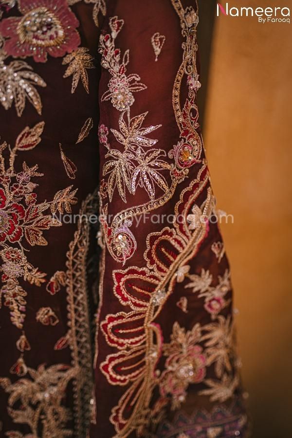 Pakistani Maroon Color Dress for Wedding Party Sleeves Look Intricate Embroidery Dress For Eid Reception, Eid Reception Dola Silk Dress, Traditional Drape Embroidered Dress For Reception, Traditional Drape Embellished Dress For Reception, Festive Party Wear Embroidered Wedding Dress, Traditional Drape Embellished Embroidered Dress For Reception, Embroidered Embellished Dress For Wedding, Embroidered Embellished Dress For Reception With Traditional Drape, Eid Party Wear Gown With Embroidery