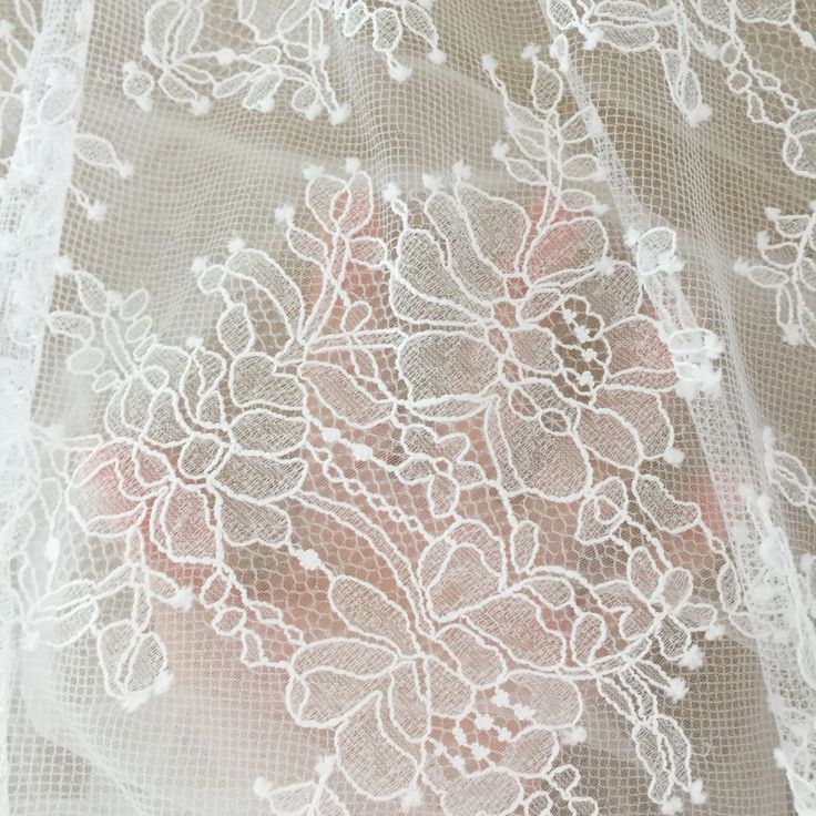 white lace with flowers on it