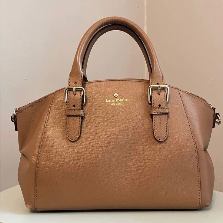 Kate Spade New York Tan Handbag Good Condition, Gently Used 15”X5”X14” Kate Spade Satchel For Everyday, Kate Spade Beige Bag For Everyday Use, Kate Spade Beige Bag For Everyday, Kate Spade Leather Shoulder Bag, Classic Kate Spade Tote Satchel, Kate Spade Classic Bag For Everyday Use, Kate Spade Top Handle Satchel For Everyday, Classic Kate Spade Bag, Classic Kate Spade Brown Satchel