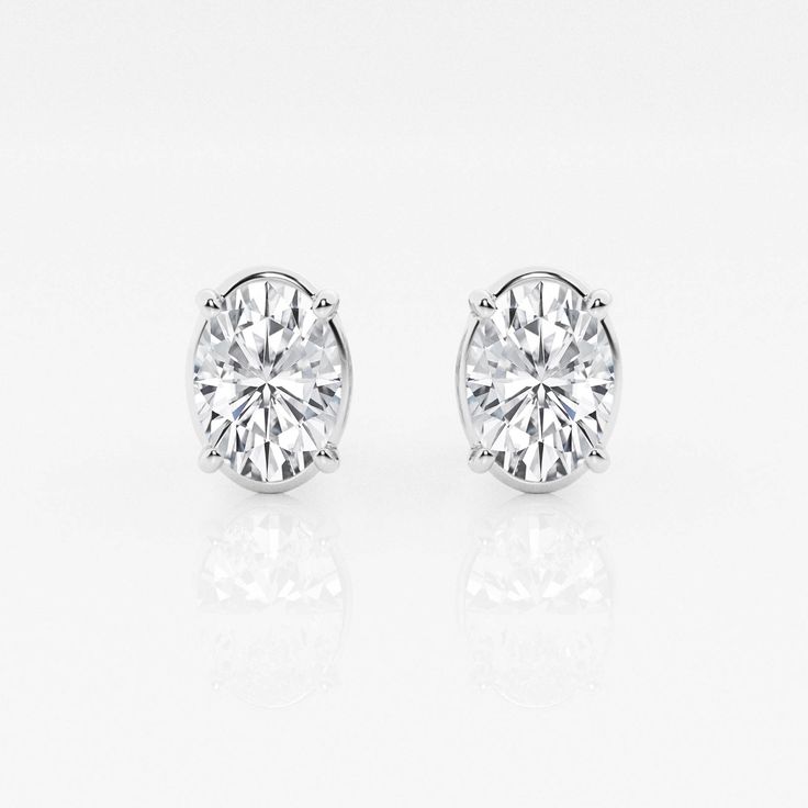 There's nothing more versatile than a pair of classic stud earrings. We love these princess cut lab grown diamond studs for every occasion. Pick the size and color best suited to your ears in the color of gold that you fancy. Luxury Gia Certified Oval Diamond Earrings, Elegant Gia Certified Oval Diamond Earrings, Luxury Oval Diamond White Diamond Earrings, Luxury Oval Diamond Earrings For Anniversary, Luxury White Gold Oval Diamond Earrings, Gia Certified Oval Diamond Earrings, Classic White Oval Diamond Earrings, Classic Oval Diamond White Diamond Earrings, Luxury Oval White Gold Diamond Earrings