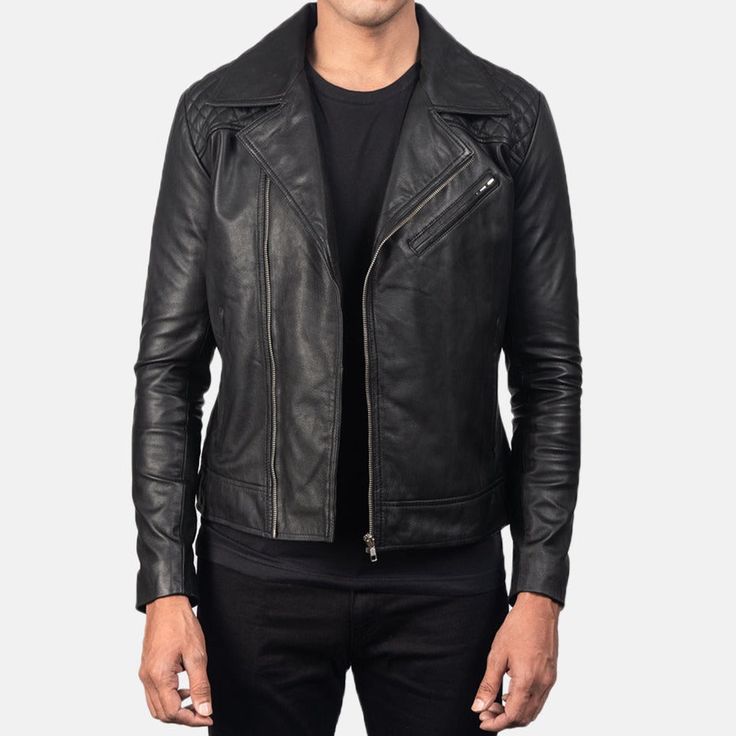 This black leather jacket has a sleek yet sophisticated design. It is made of premium-quality black leather with a matte and modern finish. This versatile leather jacket exhibits a tailored fit style that is perfect for casual and formal gatherings. The jacket ensures comfort because of its soft and quilted lining inside. This black quilted leather jacket features a wide-notch lapel with an asymmetrical zipper closure from the front. It also has a slanting zipper pocket on the chest and two slan Modern Fitted Biker Jacket For Streetwear, Modern Fitted Leather Biker Jacket, Modern Black Leather Jacket With Zip Fly, Fitted Leather Biker Jacket For Business, Modern Black Leather Jacket, Modern Black Leather Jacket With Long Sleeves, Edgy Leather Biker Jacket, Edgy Leather Biker Jacket With Long Sleeves, Edgy Long Sleeve Leather Biker Jacket