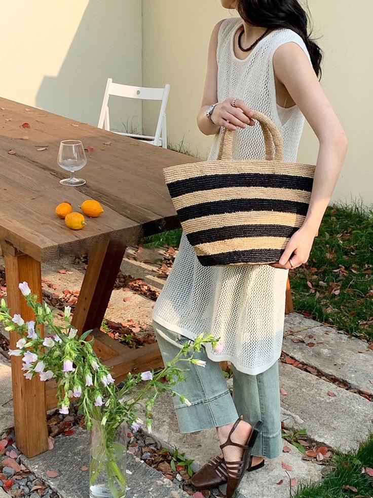 IN STOCK NOW SHIPPING FROM LOS ANGELES Add some summer vibes to your wardrobe with Elena Handbags' Raffia Basket Bag. Perfect for a day at the beach or a summer picnic, this bag features a stylish striped design and is made from durable and lightweight raffia material. Stay on trend and stand out with this must-have summer fashion accessory! Natural Soft Raffia Straw Handmade Size: 9"H x 14"W x 7"D Designer Style ID: 8652 Summer Bags With Double Handle For Daily Use, Summer Bags With Double Handles For Daily Use, Summer Bags For Daily Use With Double Handle, Large Capacity Summer Tote Bag, Eco-friendly Bucket Bag For Summer, Eco-friendly Summer Bucket Bag, Trendy Straw Bag For Beach Season, Summer Bags With Braided Handles For Daily Use, Casual Summer Straw Beach Bag