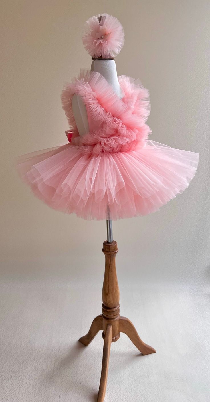 Introducing our Exquisite Salmon Tutu Dress for Kids and Babies - A Magical Fairy Dress Delight! Prepare for enchantment with our meticulously crafted Salmon Tutu Dress. Perfect for 1st-year birthdays, Halloween, festivals, special occasions, adorable toddler girl costumes, and as a stunning first birthday dress, this creation is a true showstopper. 👑 Unmatched Comfort: Soft Tutu on the outside, cotton lining on the inside. No itching or irritation, just pure comfort for your little fairy. 🌟 T Whimsical Princess Dress With Ruffles For Dress-up, Playful Ruffled Tutu Dress, Playful Ruffled Tutu Dress In Tulle, Playful Ruffled Tulle Tutu Dress, Fairy Style Princess Dress With Ruffles For Dress-up, Fairytale Party Dress With Ruffles, Whimsical Tulle Fairy Dress With Ruffles, Easter Birthday Princess Dress With Ruffles, Whimsical Ruffled Fairy Dress For Dress-up