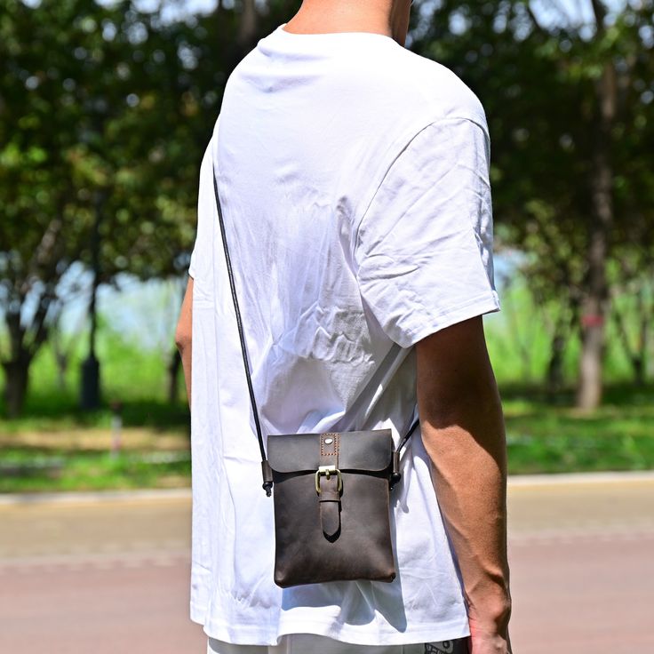 Shoulder bag for men,messenger bags,small messenger bag,Crossbody bags for men,Leather Messenger Bag for Men,leather sling bag for men,Leather Crossbody phone for men, A nice leather gift for him, Anniversary gift... --ABOUT PRODUCT INFORMATION-- 18x15x2.5cm/7.09x5.91x0.98in Weight:0.2 kg/0.44 Pounds Color:Coffee The length of the shoulder strap after being folded in half is about 58cm/22.83in The dimensions are measured manually, and there may be errors. --ABOUT LEATHER-- The bag  is made of the premium first layer cowhide, It has a discoloration effect and It can bring a more natural and unique texture to the leather surface. Because it is real cowhide, the product sometimes inevitably has some natural flaws. But after using for a period of time, these natural traces will gradually fade. Portable Brown Phone Bag For Outdoor, Brown Outdoor Phone Bag, Large Capacity Leather Phone Bag For Travel, Casual Phone Bag With Anti-theft Pocket For Daily Use, Anti-theft Crossbody Phone Bag, Casual Brown Phone Bag For Outdoor, Daily Use Crossbody Phone Bag With Anti-theft Pocket, Large Capacity Phone Bag For Travel, Black Phone Bag With Anti-theft Pocket For Everyday