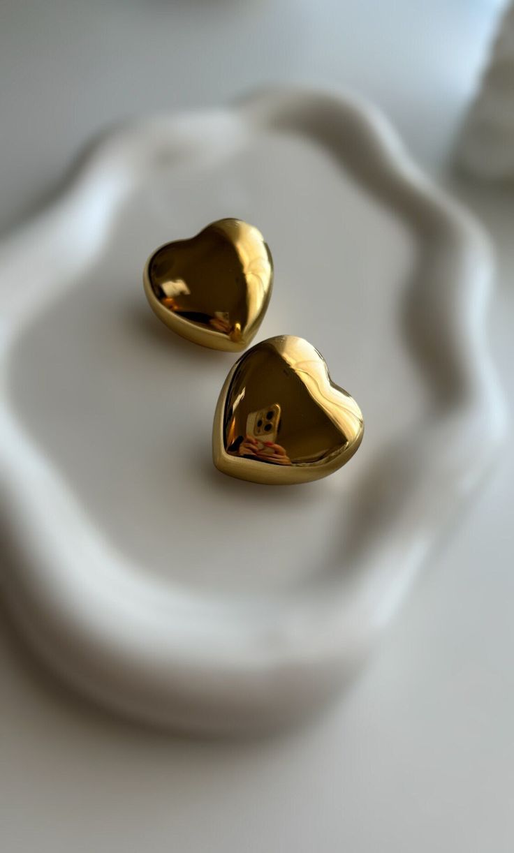 Earring Type: Stud Earrings Style: Trendy Material: Stainless Steel Craft: 18k Gold Vacuum Plated Waterproof and Tarnish Free Plating: 18k Gold Plated Fashionable Jewelry Usage: Daily Wear, other Trendy Heart-shaped Yellow Gold Earrings, Trendy Gold Double Heart Earrings, Trendy Gold Hypoallergenic Heart Earrings, Gold Heart Earrings In Minimalist Style, Gold Classic Heart Earrings, Classic Gold Heart Earrings With Heart Charm, Classic Gold Heart Earrings, Gold Heart Charm Round Earrings, Gold Heart Pendant Earrings For Everyday