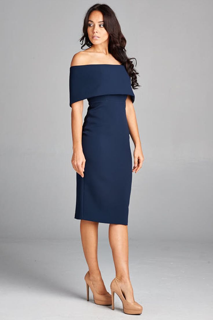 This stunning cocktail dress exudes sophistication with it's sleek form fitting lines. The off-the-shoulder dress has a wide fold-over cuff and exposed back zipper. With it's midi length silhouette we see a hint of the 1950's vintage look but with a modern twist on the MadMen era. So pair this chic dress with some sexy high heels and wear this indigo colored dress to a cocktail party. Hello Don Draper... By AG Studio. Available in indigo. Made in the USA. Business Cocktail Dress, Butterfly Couture, Coctail Dresses, 파티 드레스, Social Butterfly, Mothers Dresses, Dress Images, Valentines Party, Modern Dress