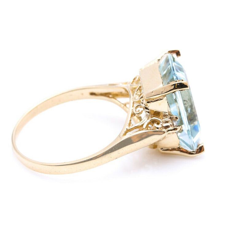 6.58 Carats Impressive Natural Aquamarine and Diamond 14K Yellow Gold Ring Suggested Replacement Value: Approx. $4,000.00 Total Natural Aquamarine Weight is: Approx. 6.50 Carats Aquamarine Measures: Approx. 12.00 x 10.00mm Natural Round Diamonds Weight: Approx. 0.08 Carats (color G-H / Clarity SI1-SI2) Ring total weight: Approx. 3.2 grams Disclaimer: all weights, measurements and colors are approximate and may vary slightly from the listed dimensions or as seen in the image. All pictures are mag Luxury 14k Gold Sapphire Ring With Hallmark, Luxury 14k Gold Sapphire Ring Hallmarked, Luxury Yellow Gold Sapphire Ring With Diamond Cut, Luxury Sapphire Ring With Prong Setting For Formal Events, Luxury Oval Sapphire Ring Stamped 14k, Emerald Cut Gemstone Rings For Evening, Formal Sapphire Ring With Cushion Cut, Formal Sapphire Ring With Cushion Diamond Cut, Luxury Yellow Gold Sapphire Cushion Cut Ring