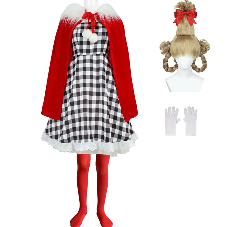 a doll dressed in a dress and red coat with white gloves on her feet, standing next to a mannequin