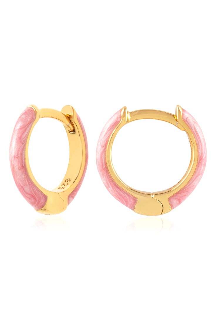 Easy-to-wear hoop earrings will add significant polish to even your most casual ensembles. 1/2" drop; 1/8" width Hinge with snap-post closure Sterling silver with goldtone plate/enamel Imported Nickel-free Enamel Round Hoop Earrings, Round Enamel Hoop Earrings As A Gift, Gold Enamel Huggie Earrings As Gift, Trendy Enamel Huggie Earrings, Trendy Round Enamel Hoop Earrings, Pink Enamel Hoop Jewelry, Nickel Free Enamel Hoop Jewelry, Nickel-free Enamel Hoop Earrings, Nickel-free Enamel Hoop Jewelry