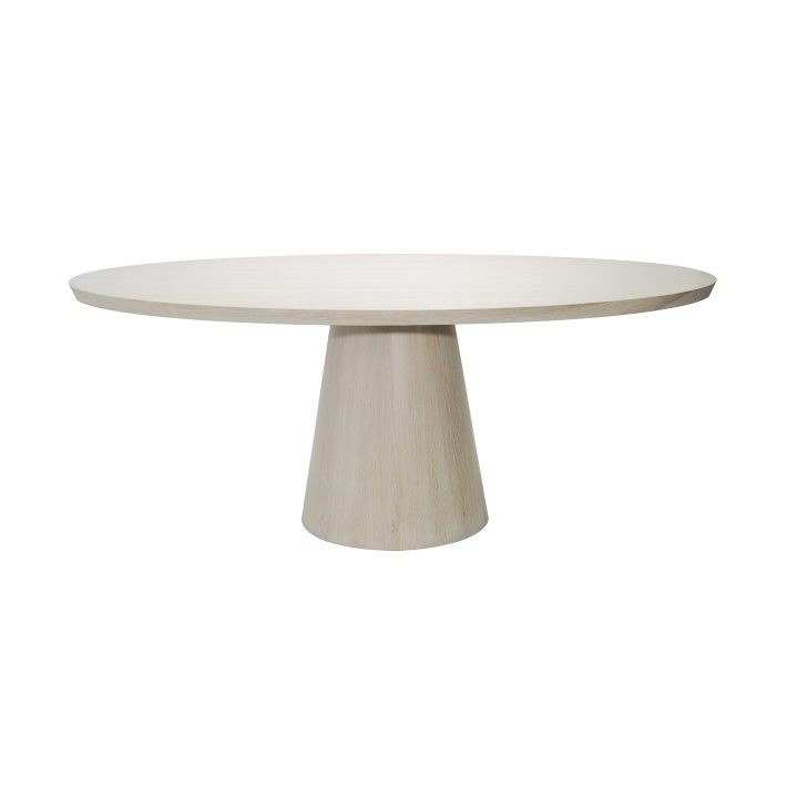 a white table with an oval top on a white background and no people around it