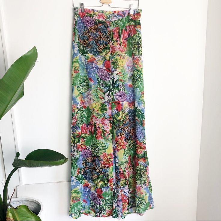 This Beach Wear Set Is Super Adorable. Crop Top Has Elastic At The Top At The Top And Bottom With Bell Sleeves. Pants Are Wide Leg With Elastic Back. Top Size: Pit To Pit: 18” Length: 9” Pants Size: Waist: 15” Length:49” Inseam:34” B12/Jo Bohemian Bottoms With Tropical Print For Spring, Bohemian Tropical Print Bottoms For Spring, Multicolor Tropical Print Bottoms For Day Out, Colorful Patterned Bottoms For Beach And Summer, Colorful Patterned Summer Beach Bottoms, Multicolor Floral Print Bottoms For Beachwear, Green Floral Print Bottoms For Beach Season, Vibrant Print Summer Bottoms For Spring, Green Bottoms For Spring Beach Party