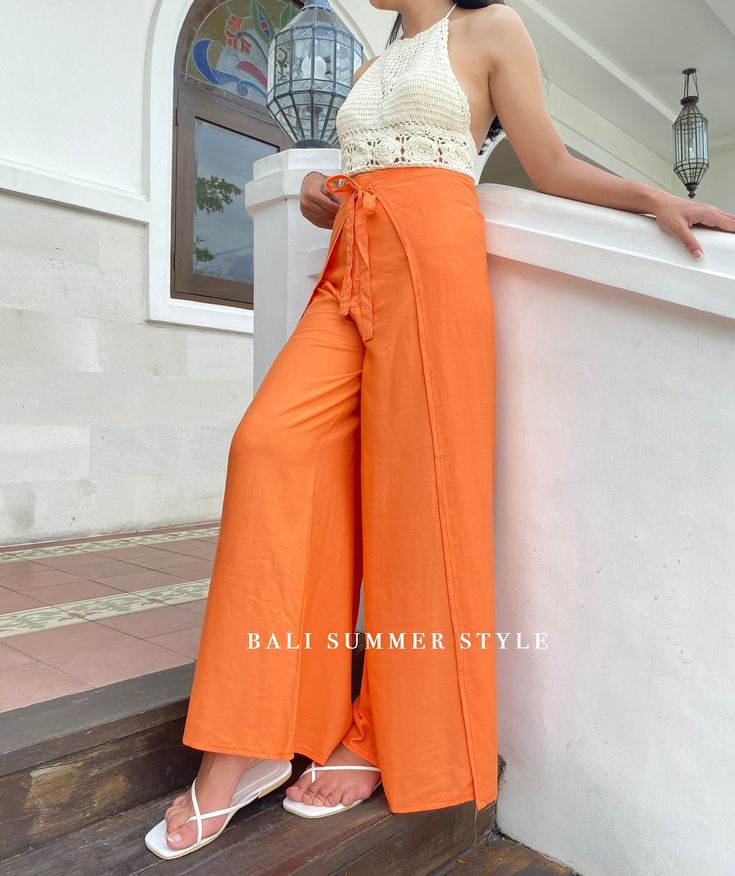 - Original Jepun Warp Pants - Made of Soft Cotton, Rayon, Lightweight ITEMS DESCRIPTION : A smooth moving and comfortable yet stylish culottes for women! Our collection is homemade and tailored with love and care to the details by our local tailors. This is made especially for summer wear collection as it is made from high quality rayon material in orange color which is breathable, refreshing, soft and super comfortable. This pant has added side cleavage to provide more free movement space for y Festival Trousers, Bali Beach, Wrap Pants, Free Movement, Cute Pants, Pants Summer, Summer Pants, Beach Pants, Fabric Belt