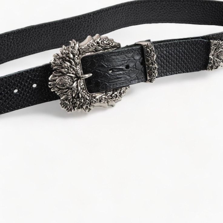 Refine your style with this premium black leather belt, featuring an intricately designed silver buckle that exudes timeless elegance. Perfect for making a bold statement, this belt combines luxury with practicality, solving the challenge of finding a stylish yet durable accessory for any occasion. Crafted from genuine leather, its textured design and exquisite buckle add sophistication to casual and formal ensembles. With a width of 4 cm (1.6 inches), this belt offers a secure, comfortable fit Luxury Designer Silver Belts, Black Adjustable Belt With Silver Buckle, Adjustable Black Belts With Silver Buckle, Adjustable Black Belt With Silver Buckle, Formal Adjustable Belts With Buckle Closure, Elegant Adjustable Belts With Buckle Closure, Adjustable Formal Belt With Buckle Closure, Adjustable Belt With Buckle Closure For Formal Wear, Black Leather Belt Buckles With Silver Buckle