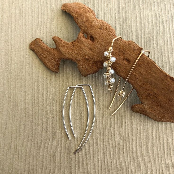 "If you love threader or barely there earrings, these are a great solution! Especially for those with sensitive ears. You can wear them as is, wire wrap some beads into them, or just get some wire and make a messy wrap like shown in the photo. These are made using .925 sterling silver (nickel free). The front and back have been hammered to give them some character and detail. Measurements: Back length: 1.5\" Front length: 1.25\" Width: 3/8\" These are sold by the pair. Please note, I make these Silver Threader Earrings, Hammered Earrings, Earring Hook, Ear Gauges, Making Earrings, Earrings Simple, Threader Earrings, Small Earrings, Odessa