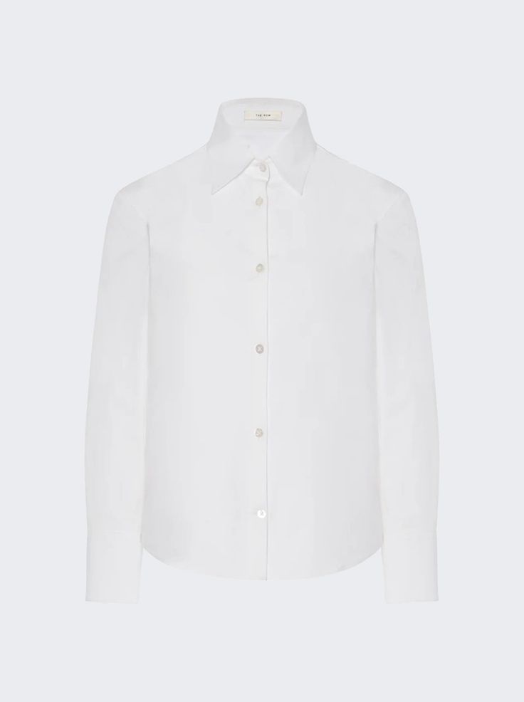 "Find THE ROW Frou Shirt on Editorialist. Petite button-up Cotton poplin Classic shirt hem French placket with mother-of-pearl buttons Dimensions: Model is 5'9\"/175cm and is wearing a size US4 Composition: 96% Cotton, 4% Elastane Care: Care according to label" Classic Blouse With Spread Collar And Covered Buttons, Daywear Blouse With Fold Down Collar And Buttons, Daywear Blouse With Buttons And Fold Down Collar, Luxury Spring Shirt With Button Closure, Classic Blouse With Collar And Concealed Placket, Tailored Button-up Shirt, Luxury Collared Shirt With Button Cuffs, Luxury Button-up Tops With Details, Luxury Spread Collar Shirt For Daywear