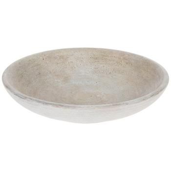 a white bowl sitting on top of a table