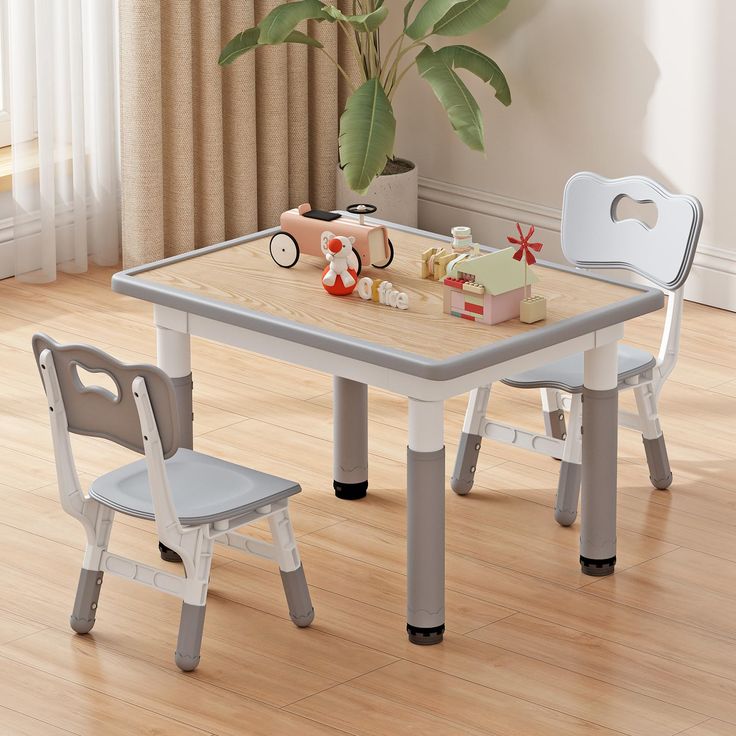 a child's table and chair set up for play