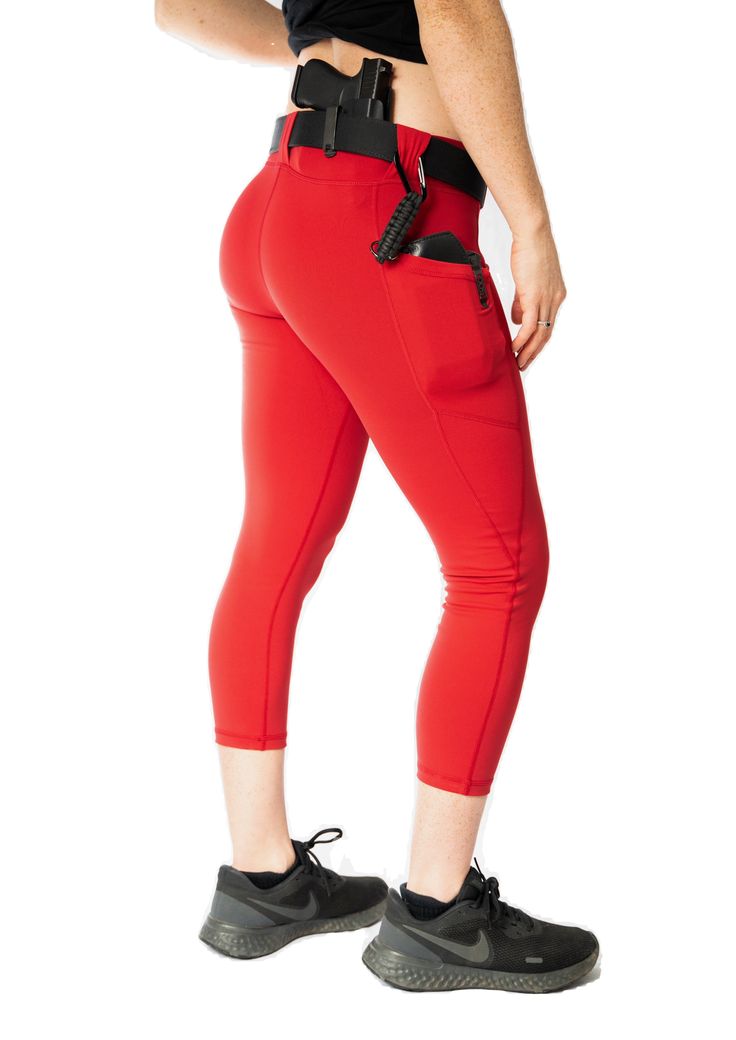 Our red hot Chili Pepper Carry Capris come with belt loops and +6in pockets, fit with quality, breathable and moisture-wicking material perfect for exercise or warm weather. Hold multiple items with these concealed carry leggings such as a knife, keys, wallet, phone, lipstick, extra mag, and many other things. With its mid-rise waist, these aren't just tactical leggings, but also a sexy way to maintain a flattering style while simultaneously providing extra support. Features: 6+ inch deep pocket Tactical Leggings, Chili Red, Red Hot Chili Peppers, Hot Chili, Chili Pepper, Capri Leggings, Red Hot, Warm Weather, Moisture Wicking