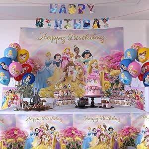 a birthday party with princesses and balloons on the table in front of a banner